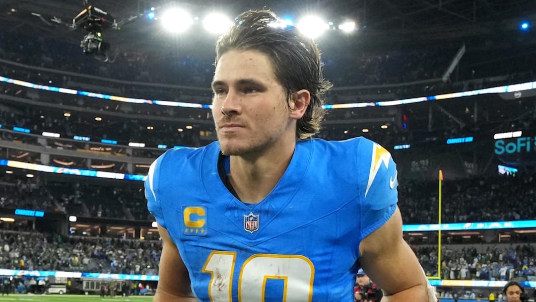 Dec 8, 2025; Inglewood, California, USA; Los Angeles Chargers quarterback Justin Herbert (10) runs off field after defeating the Philadelphia Eagles in overtime at SoFi Stadium. Mandatory Credit: Kirby Lee-Imagn Images