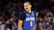 Apr 15, 2025; Orlando, Florida, USA; Orlando Magic guard Anthony Black (0) reacts after making a basket against the Atlanta Hawks in the first quarter at Kia Center. Mandatory Credit: Nathan Ray Seebeck-Imagn Images