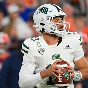Aug 31, 2024; Syracuse, New York, USA; Ohio Bobcats quarterback Parker Navarro (13) drops back to pass against the Syracuse Orange during the second half at the JMA Wireless Dome. Mandatory Credit: Rich Barnes-Imagn Images