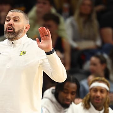 Dec 19, 2024; Phoenix, Arizona, USA; Indiana Pacers assistant coach Mike Weinar against the Phoenix Suns at Footprint Center. Mandatory Credit: Mark J. Rebilas-Imagn Images