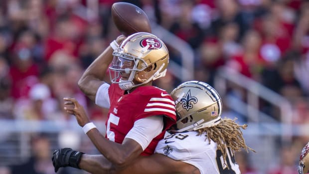 New Orleans Saints defensive end Chase Young (99) pressures San Francisco 49ers quarterback Joshua Dobbs (5) 