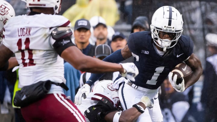 Penn State wide receiver KeAndre Lambert-Smith is pushed out of bounds after making a catch in the red zone in the first half of a NCAA football game against Massachusetts Saturday, Oct. 14, 2023, in State College, Pa. The Nittany Lions won, 63-0.