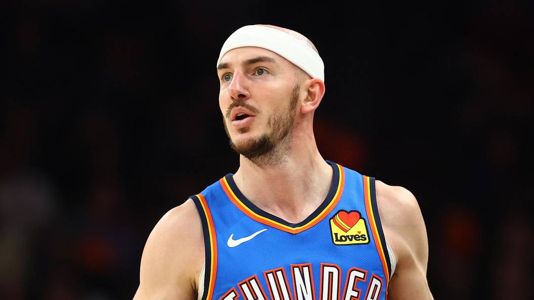 Apr 27, 2026; Phoenix, Arizona, USA; Oklahoma City Thunder guard Alex Caruso (9) against the Phoenix Suns during game four of the first round of the 2026 NBA Playoffs at Mortgage Matchup Center. Mandatory Credit: Mark J. Rebilas-Imagn Images