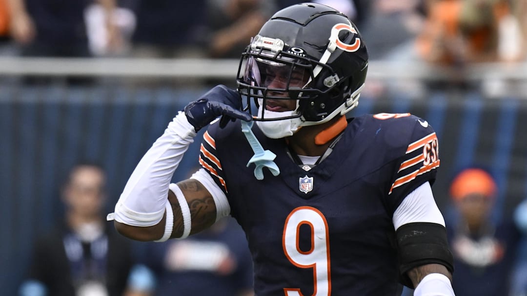 Sep 29, 2024; Chicago, Illinois, USA;  Chicago Bears safety Jaquan Brisker (9) after sacking Los Angeles Rams linebacker Jared Verse (8) during the second half at Soldier Field.