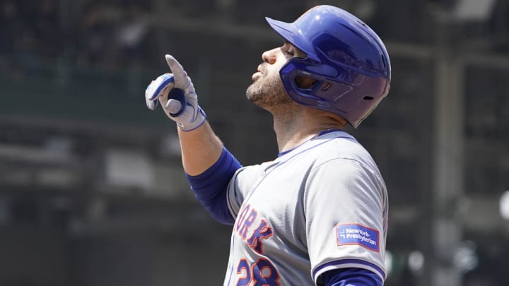 Jun 21, 2024; Chicago, Illinois, USA; New York Mets designated hitter J.D. Martinez (28) gestures after hitting a one run single against the Chicago Cubs during the fourth inning at Wrigley Field. Mandatory Credit: David Banks-USA TODAY Sports