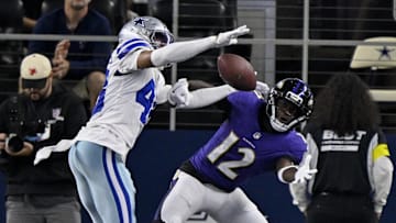 Aug 16, 2025; Arlington, Texas, USA; Dallas Cowboys cornerback Zion Childress (48) breaks up a pass intended for Baltimore Ravens wide receiver Malik Cunningham (12) during the second half at AT&T Stadium. Mandatory Credit: Jerome Miron-Imagn Images
