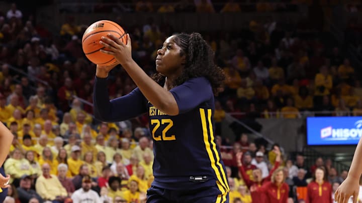 Jan 11, 2026; Ames, Iowa, USA; West Virginia Mountaineers forward Kierra Wheeler (22) looks to score against the Iowa State Cyclones during the second half at James H. Hilton Coliseum. Mandatory Credit: Reese Strickland-Imagn Images