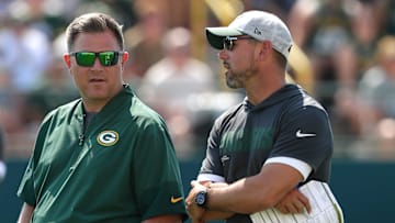 Green Bay Packers General Manager Brian Gutekunst talks with head coach Matt LaFleur during fifth day of training camp on July 28, 2025, at Ray Nitschke Field in Ashwaubenon, Wis.