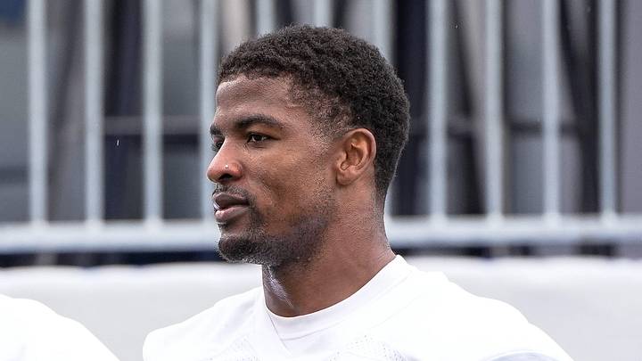 Detroit Lions cornerback D.J. Reed (4), right, and cornerback Tyson Russell (35) walk off the field after practice during training camp at Meijer Performance Center in Allen Park on Sunday, July 20, 2025.