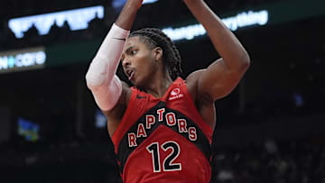 Oct 29, 2025; Toronto, Ontario, CAN; Toronto Raptors forward Collin Murray-Boyles (12) comes down with a rebound against the Houston Rockets during the second half at Scotiabank Arena. Mandatory Credit: John E. Sokolowski-Imagn Images