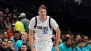 Oct 11, 2025; Dallas, Texas, USA; Dallas Mavericks forward Cooper Flagg (32) brings the ball up court against the Charlotte Hornets in the second half of a game at American Airlines Center. Mandatory Credit: Raymond Carlin III-Imagn Images