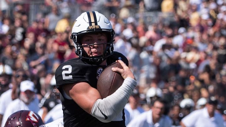 Vanderbilt ’s Diego Pavia runs the ball during Saturday’s game between Vanderbilt and Virginia Tech at FirstBank Stadium in Nashville , Tenn., Saturday, Aug. 31, 2024.