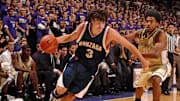 Dec. 4, 2005; Seattle, WA, USA; Gonzaga Bulldogs forward Adam Morrison (3) drives to the basket against the Washington Huskies in the first half at the Bank of America Arena.