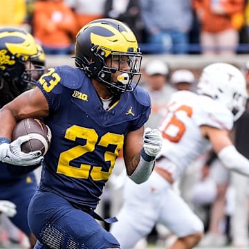 Sep 7, 2024; Ann Arbor, Michigan, USA; Michigan running back Jordan Marshall (23) returns a kickoff from Texas during the second half at Michigan Stadium. Mandatory Credit: Junfu Han-USA TODAY Network via Imagn Images