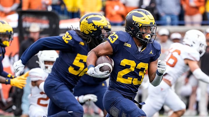 Sep 7, 2024; Ann Arbor, Michigan, USA; Michigan running back Jordan Marshall (23) returns a kickoff from Texas during the second half at Michigan Stadium. Mandatory Credit: Junfu Han-USA TODAY Network via Imagn Images