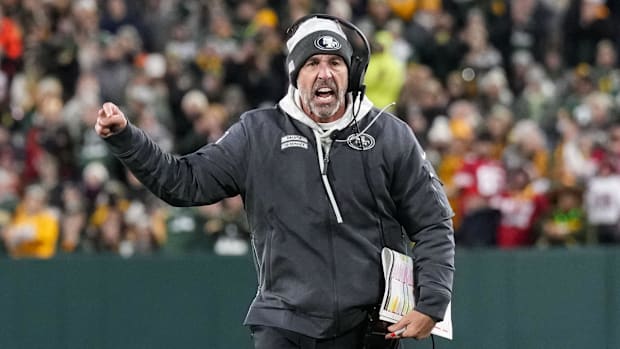 San Francisco 49ers head coach Kyle Shanahan argues with an official