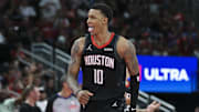 Nov 21, 2025; Houston, Texas, USA; Houston Rockets forward Jabari Smith Jr. (10) reacts after making a basket during the fourth quarter against the Denver Nuggets at Toyota Center. Mandatory Credit: Troy Taormina-Imagn Images
