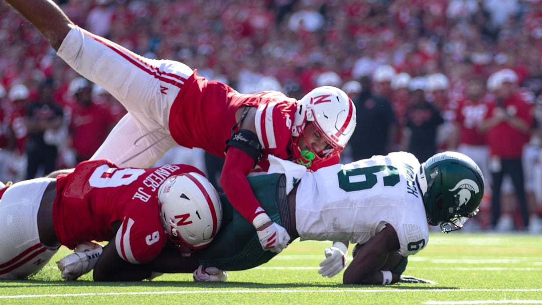 The top vote-getter for Husker Defensive MVP, DeShon Singleton, joins Vincent Shavers (9) in bringing down a Michigan State ball carrier earlier this season.