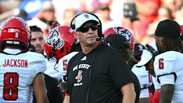 Sep 20, 2025; Durham, North Carolina, USA;  NC State Wolfpack head coach Dave Doeren during the second quarter against the Duke Blue Devils at Wallace Wade Stadium. Mandatory Credit: Zachary Taft-Imagn Images