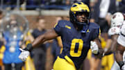 Sep 14, 2024; Ann Arbor, Michigan, USA;  Michigan Wolverines defensive end Josaiah Stewart (0) pursues a play on defense against the Arkansas State Red Wolves at Michigan Stadium. Mandatory Credit: Rick Osentoski-Imagn Images