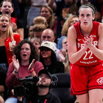 Indiana Fever guard Caitlin Clark (22) celebrates while on defense 