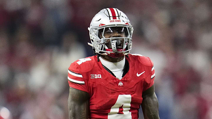 Ohio State Buckeyes wide receiver Jeremiah Smith (4) celebrates a catch during the first half of the Big Ten Conference championship game against the Indiana Hoosiers at Lucas Oil Stadium in Indianapolis on Dec. 6, 2025.