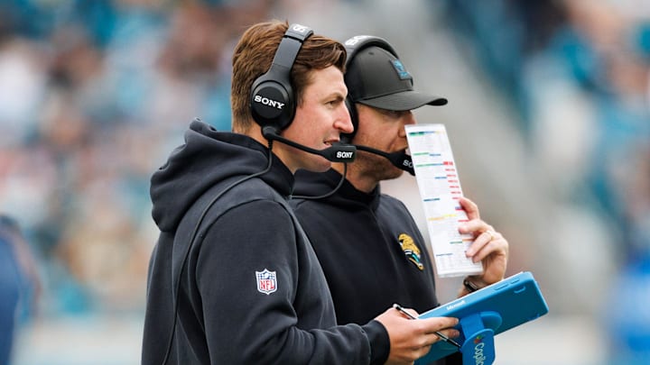 Jacksonville Jaguars offensive coordinator Grant Udinski, left, with head coach Liam Coen