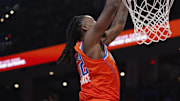 Nov 28, 2025; Oklahoma City, Oklahoma, USA; Oklahoma City Thunder guard Cason Wallace (22) dunks against the Phoenix Suns during the second half at Paycom Center. Mandatory Credit: Alonzo Adams-Imagn Images