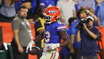 Florida running back Jadan Baugh (13) runs in for a touchdown during the second half of an NCAA football game against Tennessee at Steve Spurrier Field at Ben Hill Griffin Stadium in Gainesville, FL on Saturday, November 22, 2025. Florida lost to Tennessee 31-11[Alan Youngblood/Gainesville Sun]