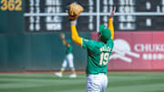 Sep 26, 2024; Oakland, California, USA; Oakland Athletics pitcher Mason Miller (19) celebrates after defeating the Texas Rangers at Oakland-Alameda County Coliseum. Mandatory Credit: Ed Szczepanski-Imagn Images