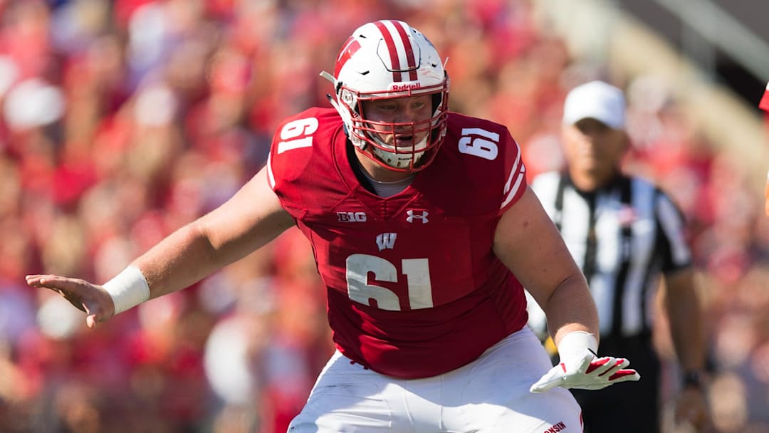 Former Wisconsin Badgers offensive lineman Tyler Biadasz (61) was released Thursday by the Washington Commanders.