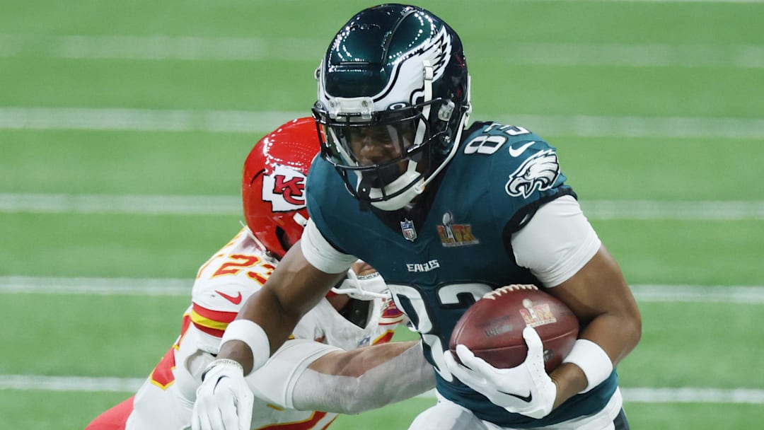 Feb 9, 2025; New Orleans, LA, USA; Philadelphia Eagles wide receiver Jahan Dotson (83) catches a pass against Kansas City Chiefs linebacker Drue Tranquill (23) in the first quarter in Super Bowl LIX at Caesars Superdome.