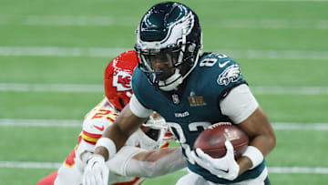 Feb 9, 2025; New Orleans, LA, USA; Philadelphia Eagles wide receiver Jahan Dotson (83) catches a pass against Kansas City Chiefs linebacker Drue Tranquill (23) in the first quarter in Super Bowl LIX at Caesars Superdome.