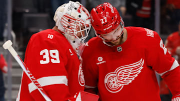 Nov 13, 2025; Detroit, Michigan, USA;  Detroit Red Wings goaltender Cam Talbot (39) and center Michael Rasmussen (27) celebrate after defeating the Anaheim Ducks at Little Caesars Arena. Mandatory Credit: Rick Osentoski-Imagn Images