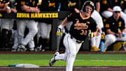 Iowa catcher Reese Moore (32) rounds first base after getting a hit against Bradley April 16, 2025 at Duane Banks Field in Iowa City, Iowa.