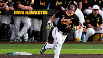 Iowa catcher Reese Moore (32) rounds first base after getting a hit against Bradley April 16, 2025 at Duane Banks Field in Iowa City, Iowa.