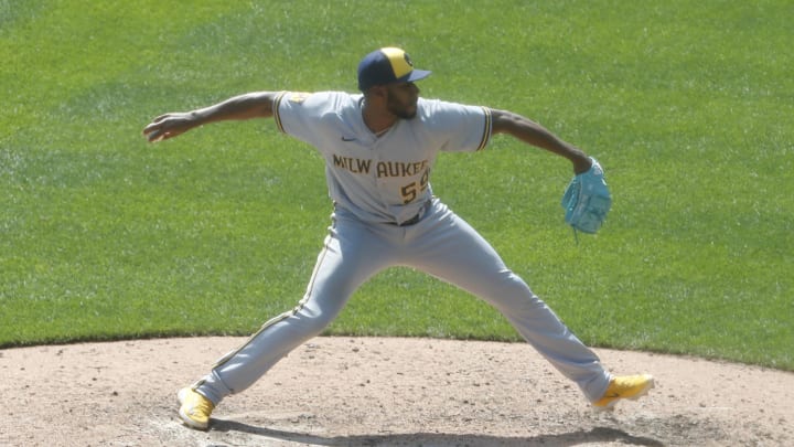 Sep 6, 2023; Pittsburgh, Pennsylvania, USA;  Milwaukee Brewers relief pitcher Elvis Peguero (59) pitches against the Pittsburgh Pirates during the seventh inning at PNC Park. Pittsburgh won 5-4. Mandatory Credit: Charles LeClaire-USA TODAY Sports