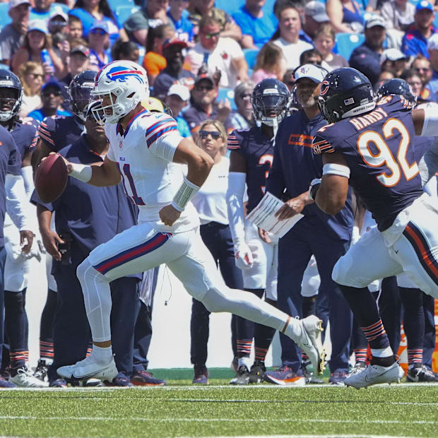 Mitchell Trubisky (11) runs