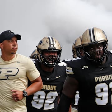 Purdue Boilermakers head coach Ryan Walters leads Purdue onto the field Saturday, Aug. 31, 2024, ahead of the NCAA football game against the Indiana State Sycamores at Ross-Ade Stadium in West Lafayette, Ind. Purdue Boilermakers won 49-0.