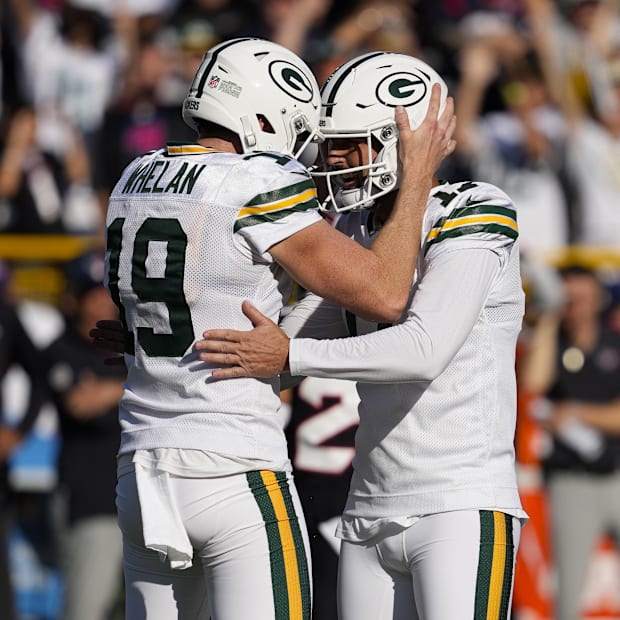 Green Bay Packers holder Daniel Whelan and kicker Brandon McManus