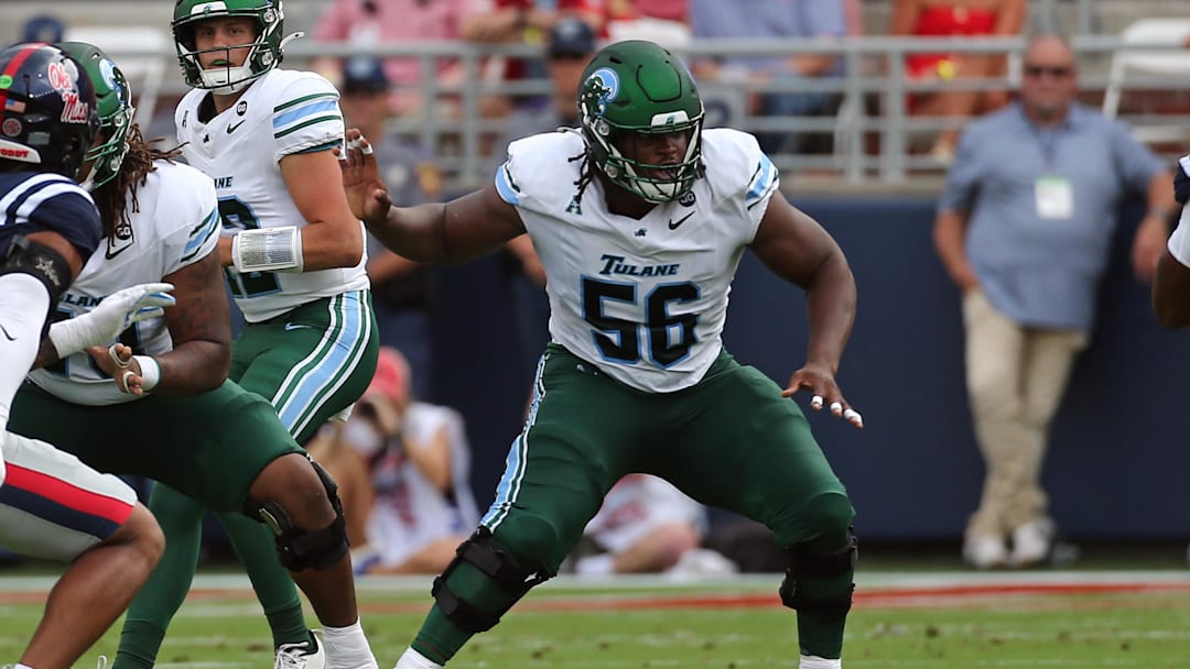 Sep 20, 2025; Oxford, Mississippi, USA; Tulane Green Wave offensive linemen Shadre Hurst (56) blocks during the first quarter against the Mississippi Rebels at Vaught-Hemingway Stadium. Mandatory Credit: Petre Thomas-Imagn Images