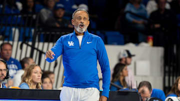 Kentucky Wildcats head coach Kenny Brooks shouts to his players during their game against the Louisville Cardinals on Saturday, Nov. 16, 2024 at Memorial Coliseum in Lexington, Ky.