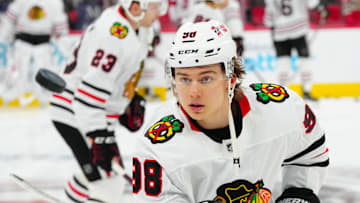 Jan 30, 2025; Raleigh, North Carolina, USA;  Chicago Blackhawks center Connor Bedard (98) watches the puck during the warmups before the game against the Carolina Hurricanes at Lenovo Center. Mandatory Credit: James Guillory-Imagn Images