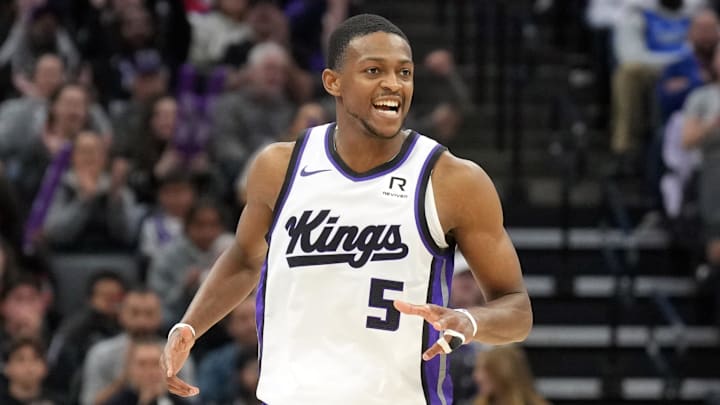 Sacramento Kings guard De'Aaron Fox reacts to scoring a basket. Sacramento Kings guard De'Aaron Fox reacts to scoring a basket.