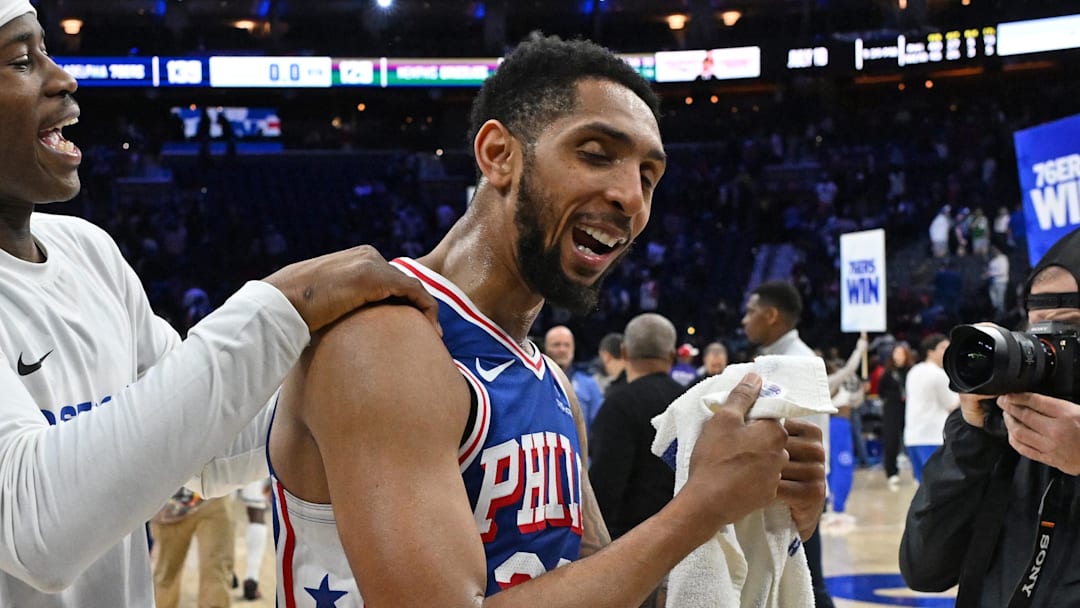 Mar 10, 2026; Philadelphia, Pennsylvania, USA; Philadelphia 76ers guard Vj Edgecombe (77) and guard Cameron Payne (20) celebrate win against the Memphis Grizzlies at Xfinity Mobile Arena. Mandatory Credit: Eric Hartline-Imagn Images