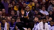 Feb 18, 2015; Minneapolis, MN, USA; Northwestern Wildcats assistant coach Armon Gates claps in the second half against the Minnesota Gophers at Williams Arena. The Northwestern Wildcats beat the Minnesota Gophers 72-66. Mandatory Credit: Brad Rempel-Imagn Images