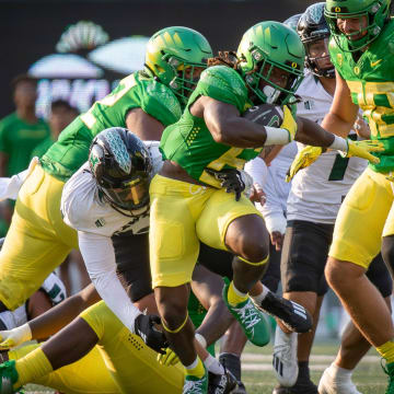 Oregon running back Noah Whittington carries the ball for the Ducks as the Oregon Ducks host Hawaii Saturday, Sept. 16, 2023, at Hayward Field in Eugene, Ore.