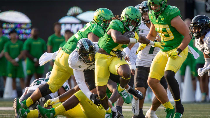 Oregon running back Noah Whittington carries the ball for the Ducks as the Oregon Ducks host Hawaii Saturday, Sept. 16, 2023, at Hayward Field in Eugene, Ore.