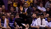 Feb 18, 2015; Minneapolis, MN, USA; Northwestern Wildcats assistant coach Armon Gates claps in the second half against the Minnesota Gophers at Williams Arena. The Northwestern Wildcats beat the Minnesota Gophers 72-66. Mandatory Credit: Brad Rempel-Imagn Images