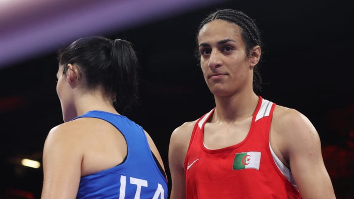 [US, Mexico & Canada customers only] Aug 1, 2024, Villepinte, France; Angela Carini of Italy and Imane Khelif of Algeria react after a women's 66kg boxing preliminary bout during the Paris 2024 Olympic Summer Games at North Paris Arena. Mandatory Credit: Isabel Infantes/Reuters via USA TODAY Sports